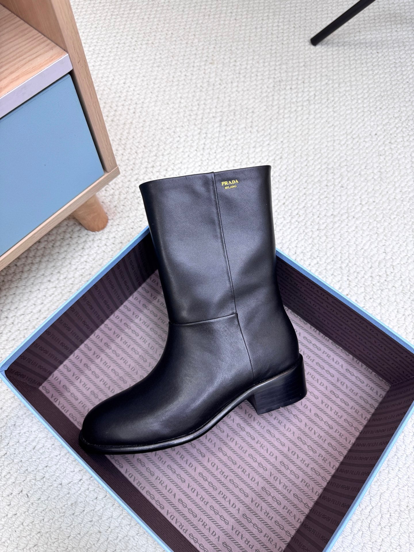 PRADA 25S LOW-CUT BOOTS IN BLACK LAMBSKIN