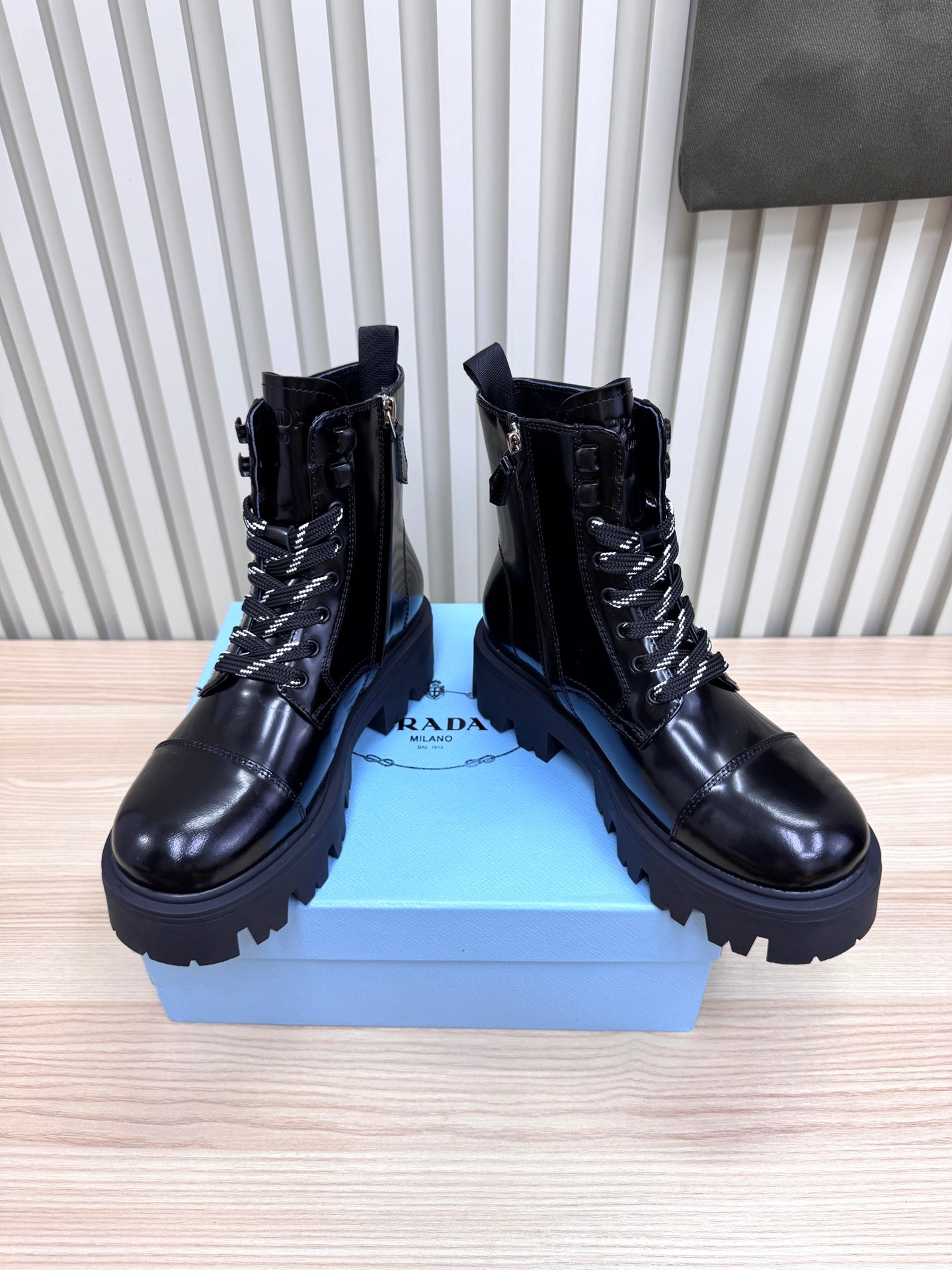 PRADA 25S MONOLITH BOOTS IN BLACK GLOSSY CALFSKIN