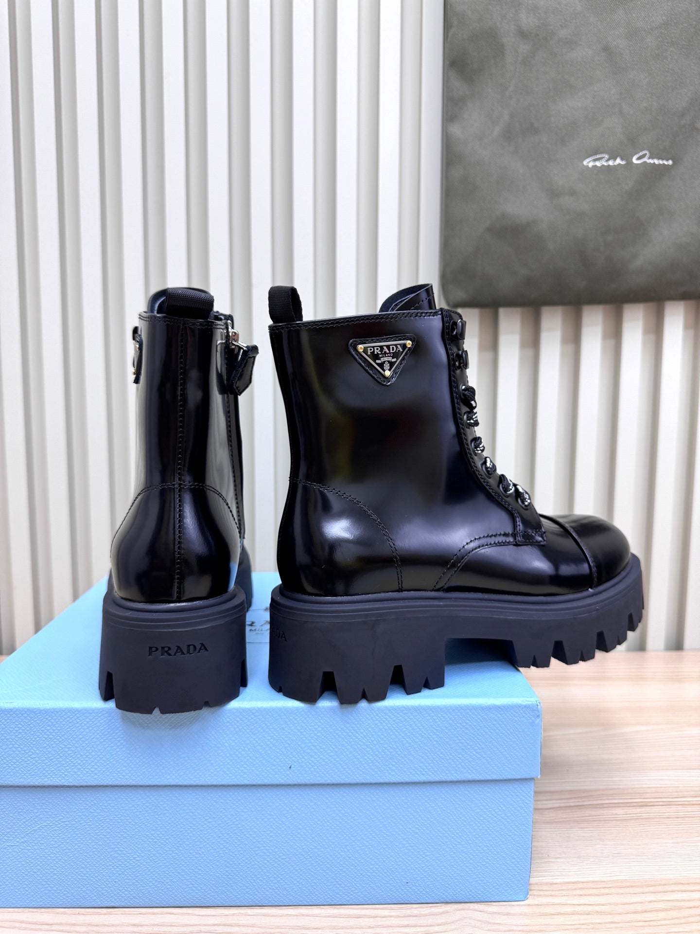 PRADA 25S MONOLITH BOOTS IN BLACK GLOSSY CALFSKIN