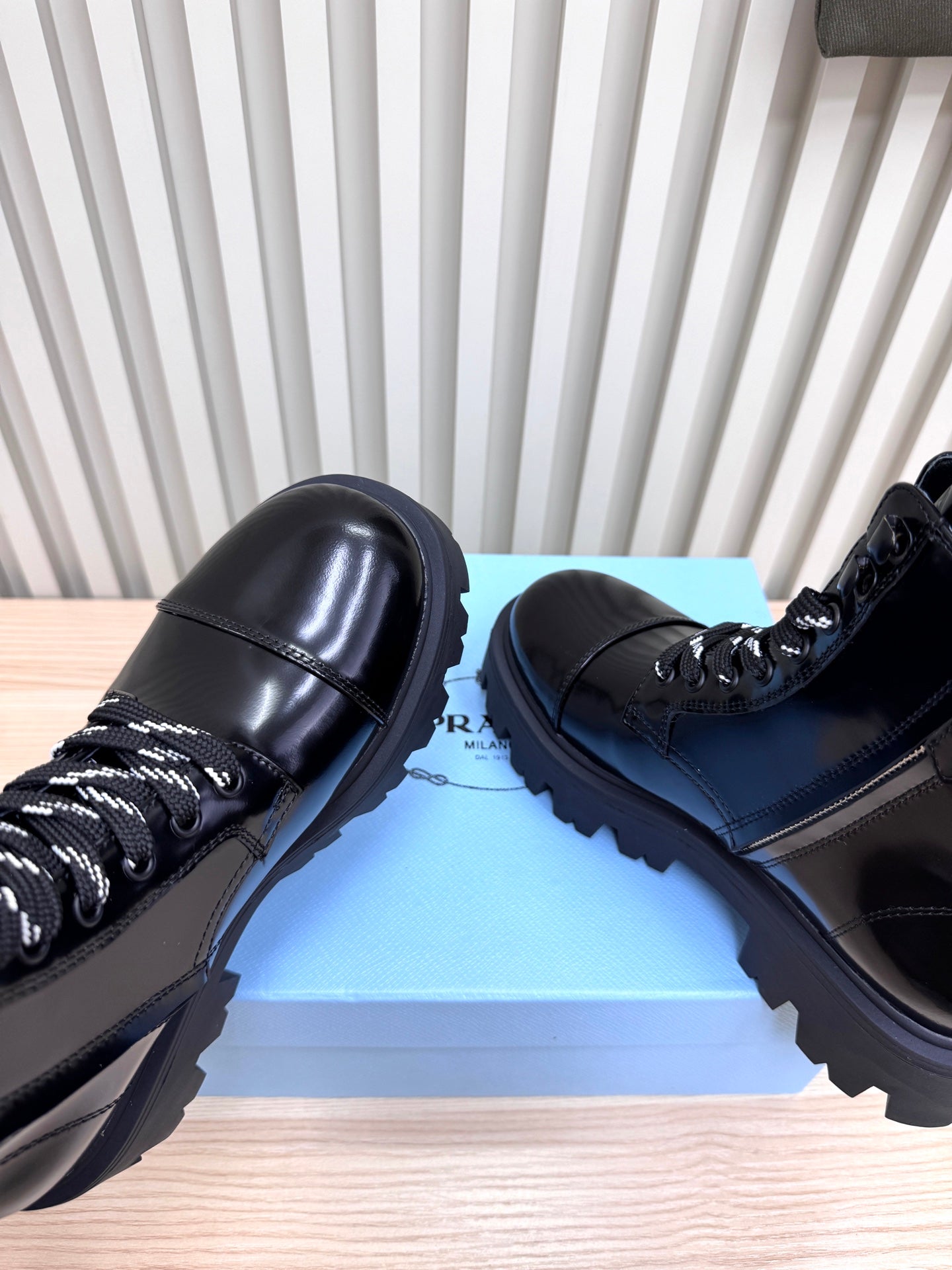 PRADA 25S MONOLITH BOOTS IN BLACK GLOSSY CALFSKIN