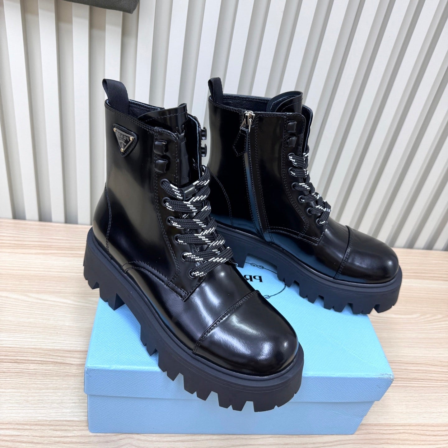 PRADA 25S MONOLITH BOOTS IN BLACK GLOSSY CALFSKIN