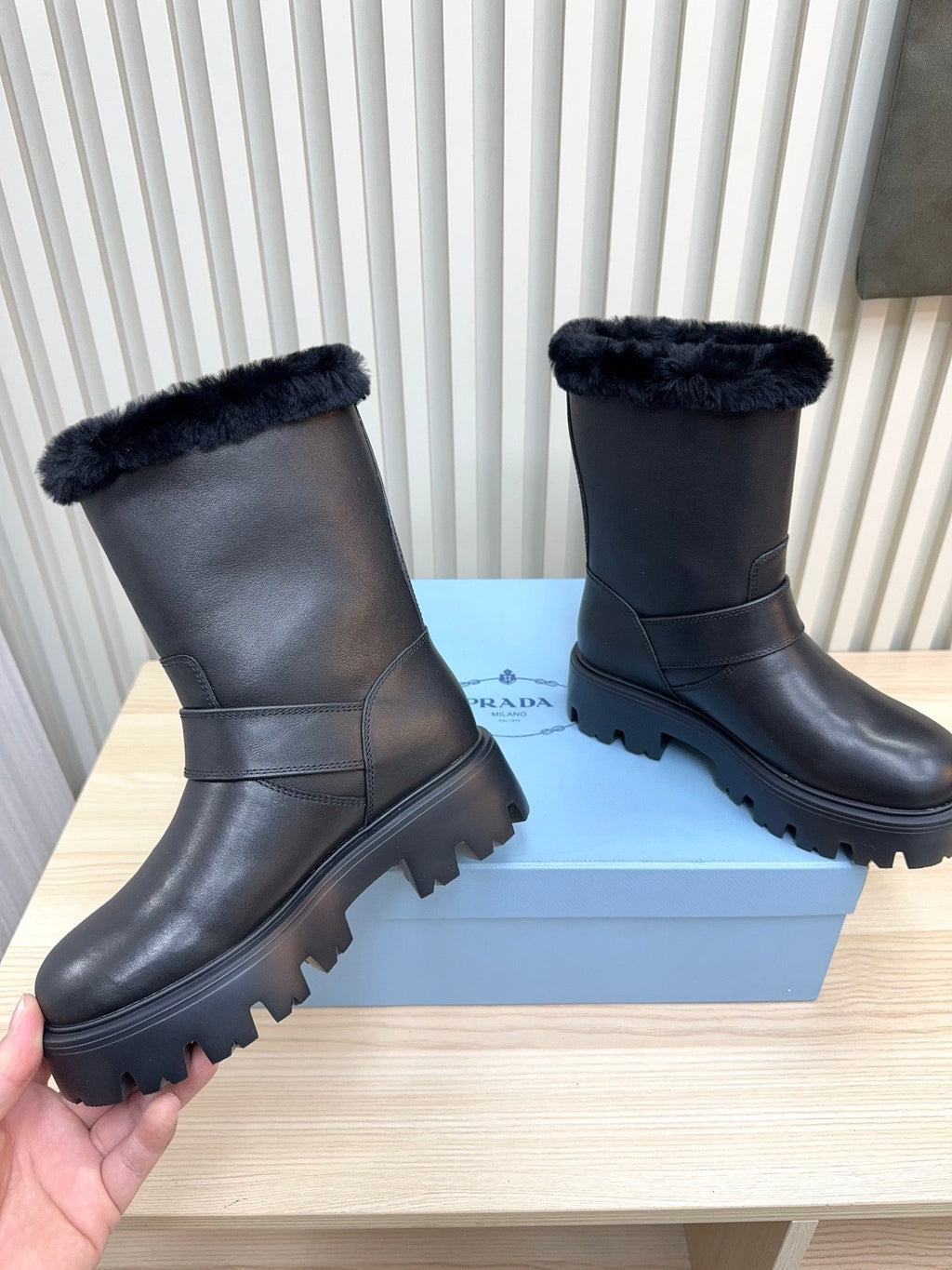 PRADA 25S MARTIN BOOTS IN BLACK CALFSKIN FUR-LINED