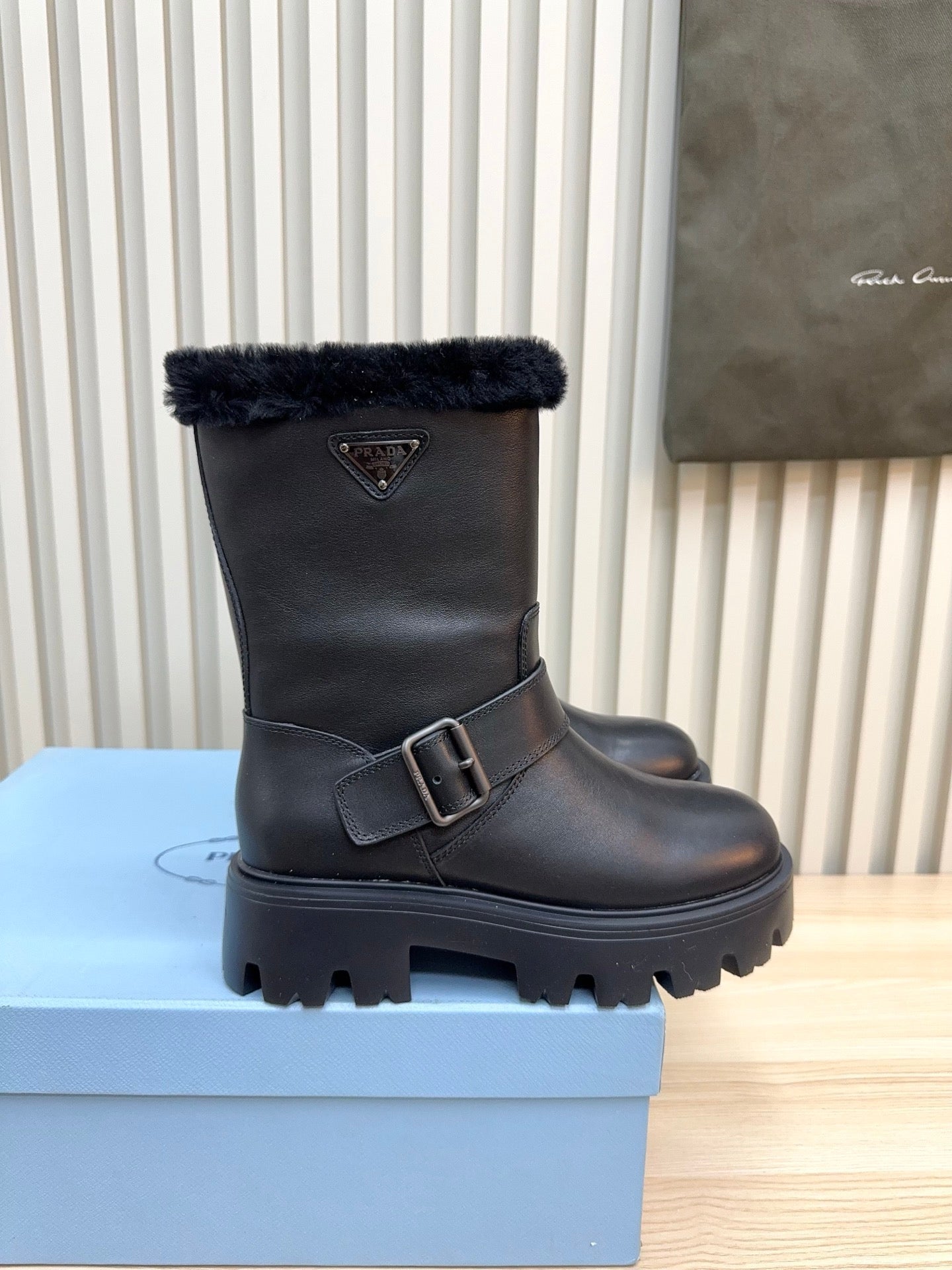 PRADA 25S MARTIN BOOTS IN BLACK CALFSKIN FUR-LINED