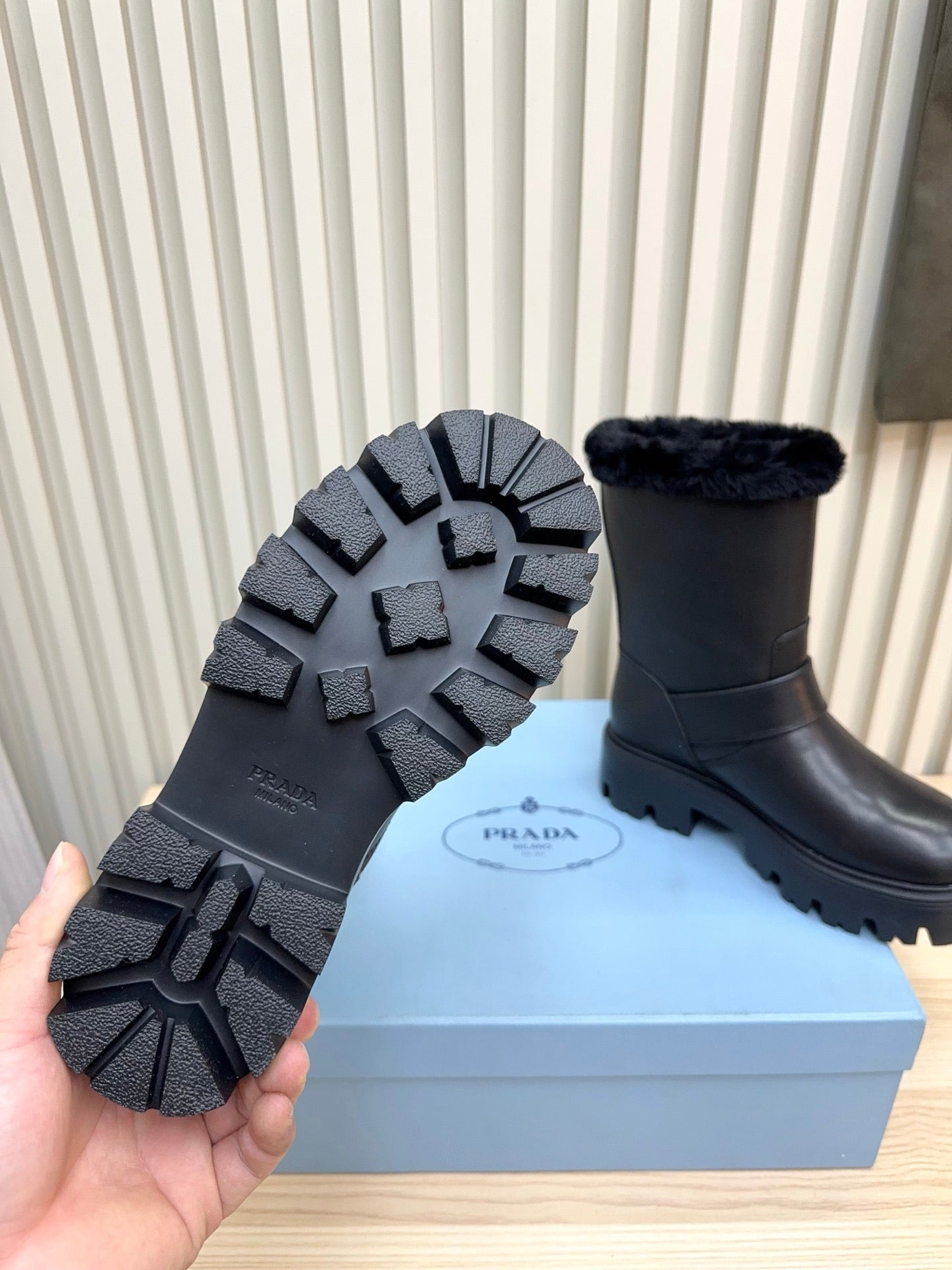 PRADA 25S MARTIN BOOTS IN BLACK CALFSKIN FUR-LINED