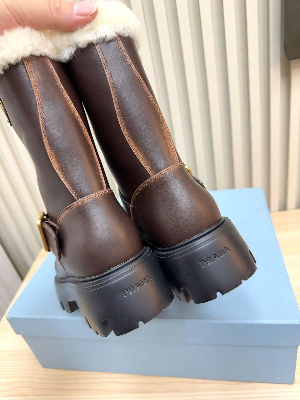 PRADA 25S MARTIN BOOTS IN DARK BROWN CALFSKIN FUR-LINED