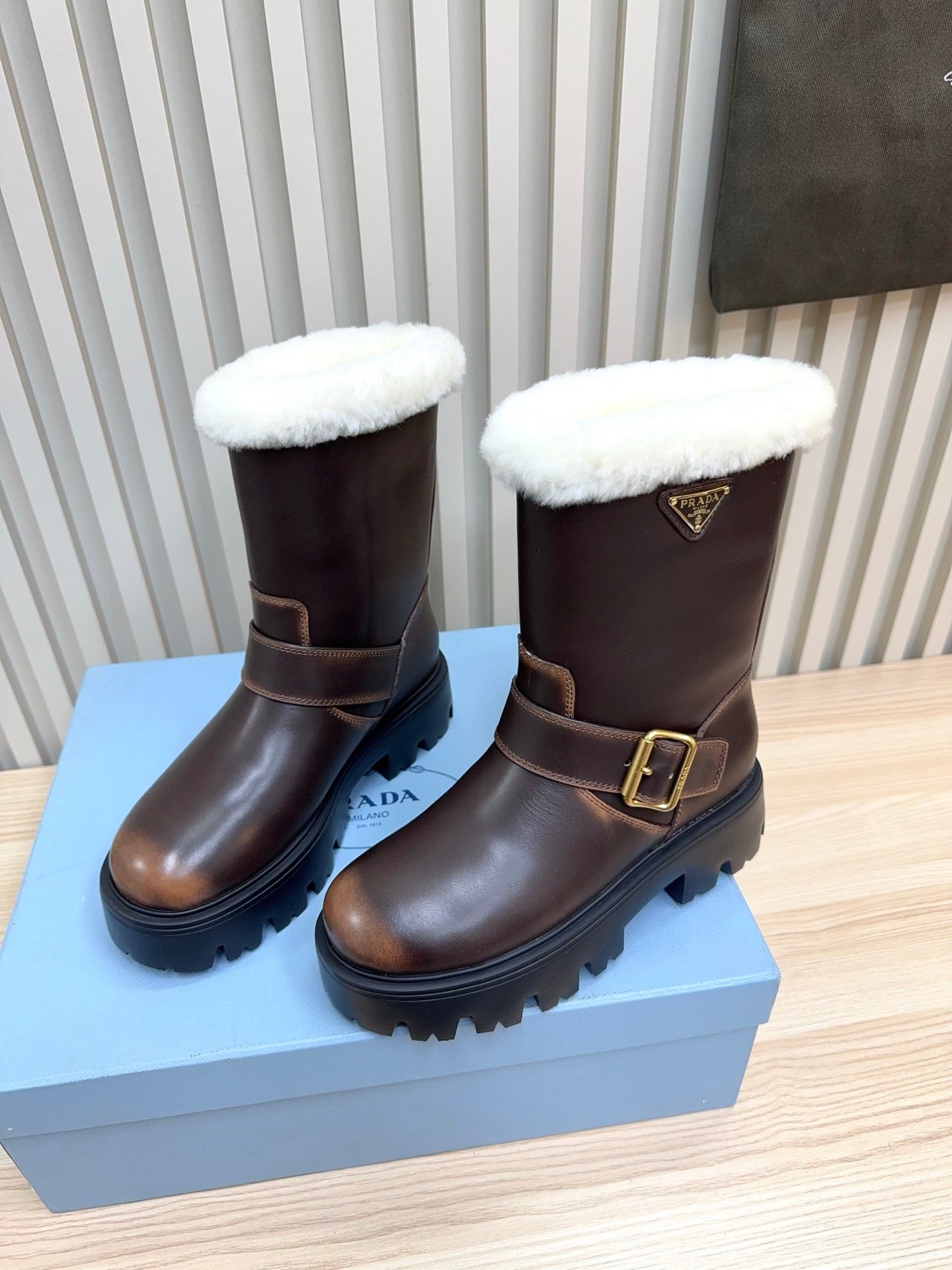 PRADA 25S MARTIN BOOTS IN DARK BROWN CALFSKIN FUR-LINED