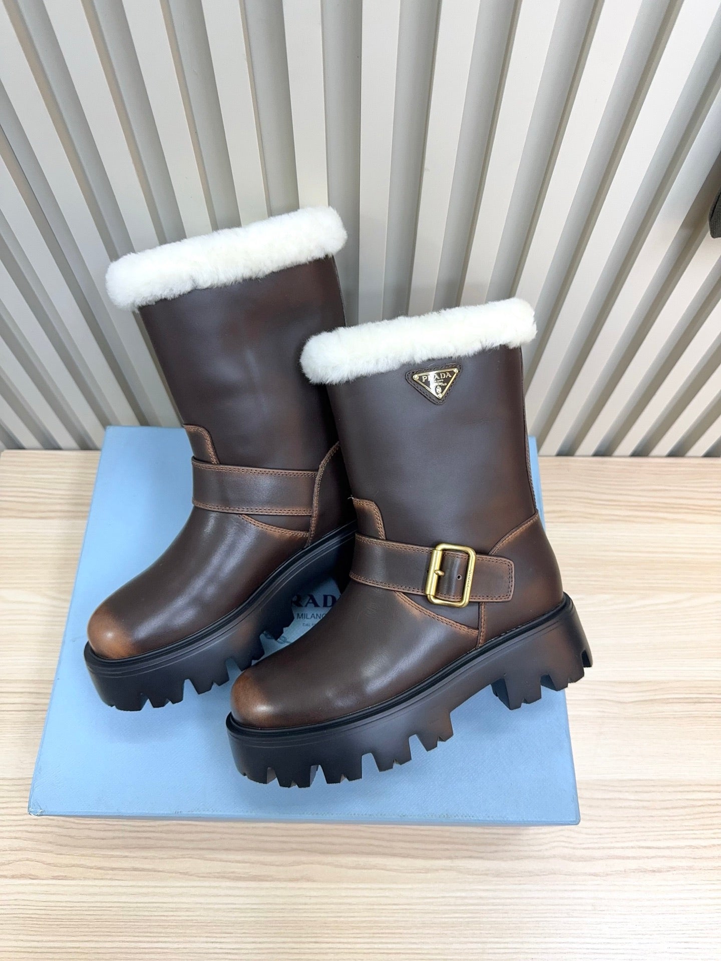 PRADA 25S MARTIN BOOTS IN DARK BROWN CALFSKIN FUR-LINED