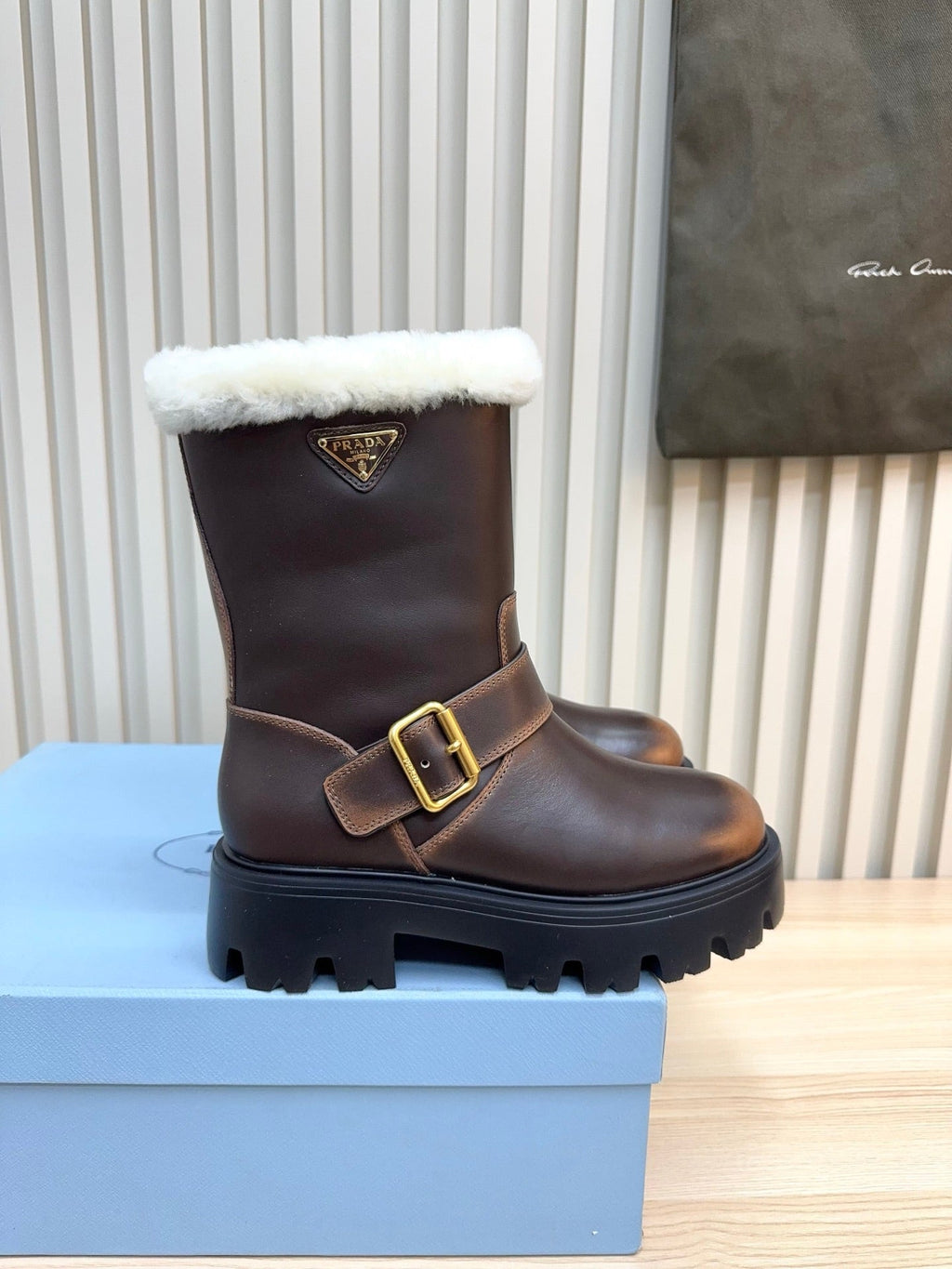 PRADA 25S MARTIN BOOTS IN DARK BROWN CALFSKIN FUR-LINED