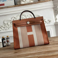 ZIP CABINE 31 BAG IN BRONZE BROWN MIX WHITE CANVAS AND CALFSKIN
