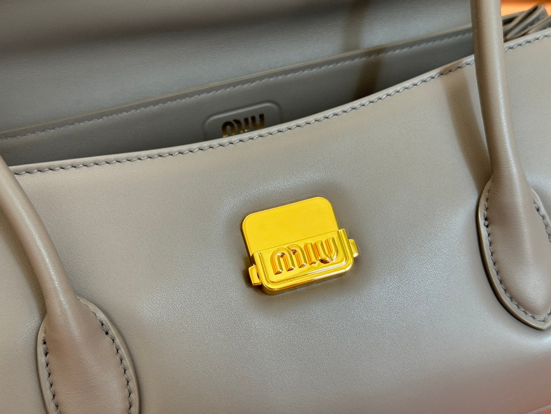 BEAU TOP HANDLE BAG 28 IN LAVA GREY GLOSSY CALFSKIN GOLD HARDWARE