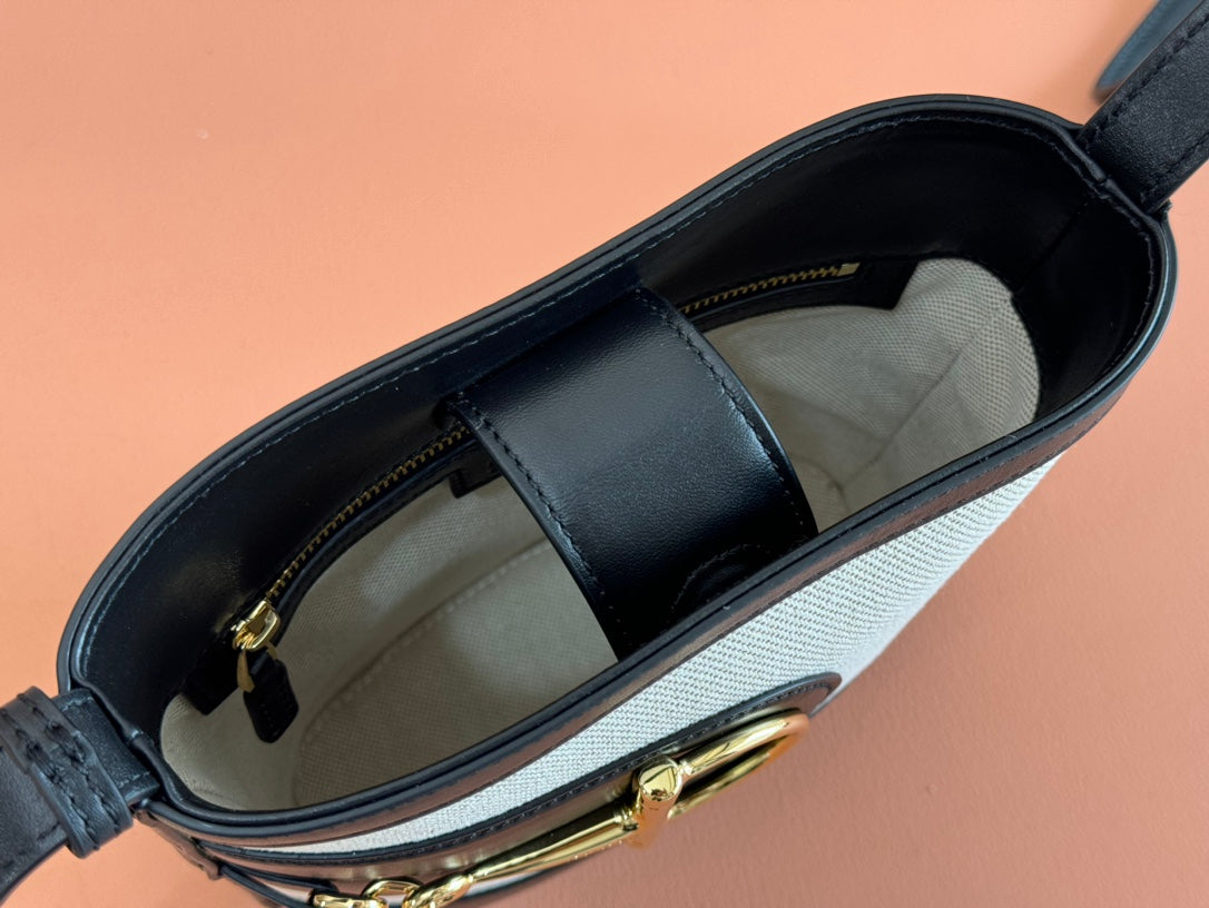 73 SMALL BUCKET BAG 20 IN NATURAL CANVAS AND BLACK CALFSKIN