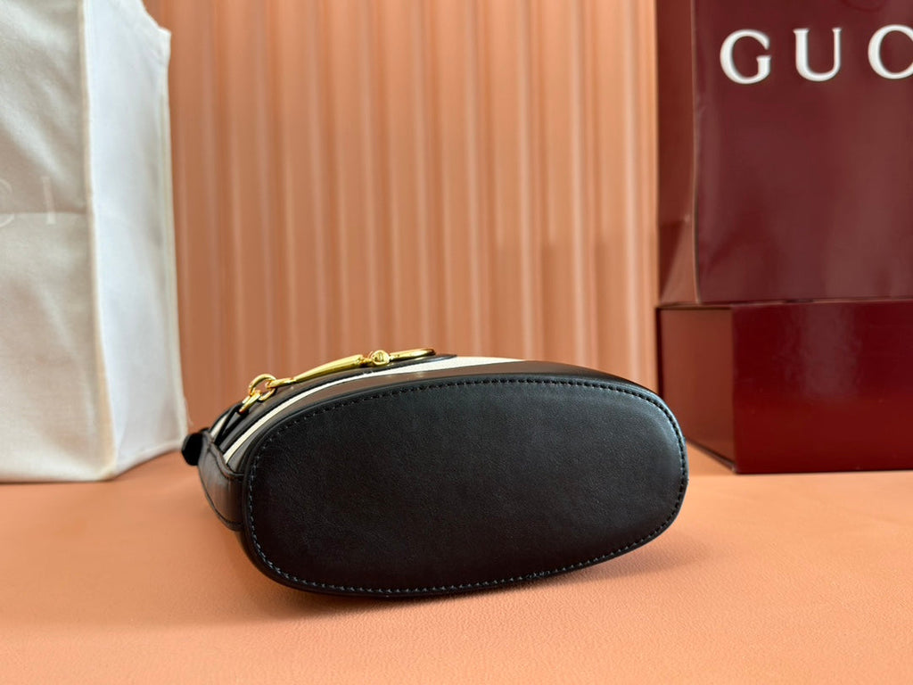 73 SMALL BUCKET BAG 20 IN NATURAL CANVAS AND BLACK CALFSKIN