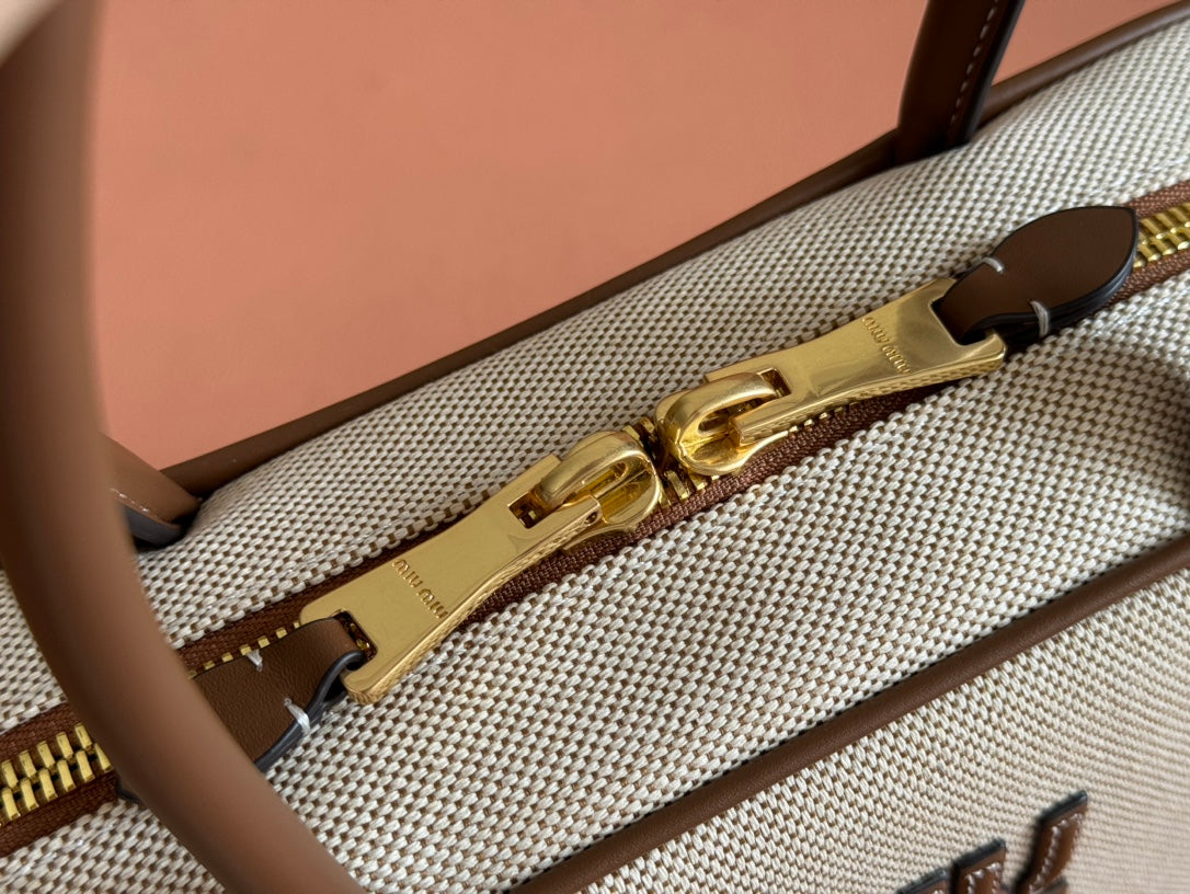 BOWLING BAG 28 IN WHITE CANVAS AND BROWN CALFSKIN TRIM