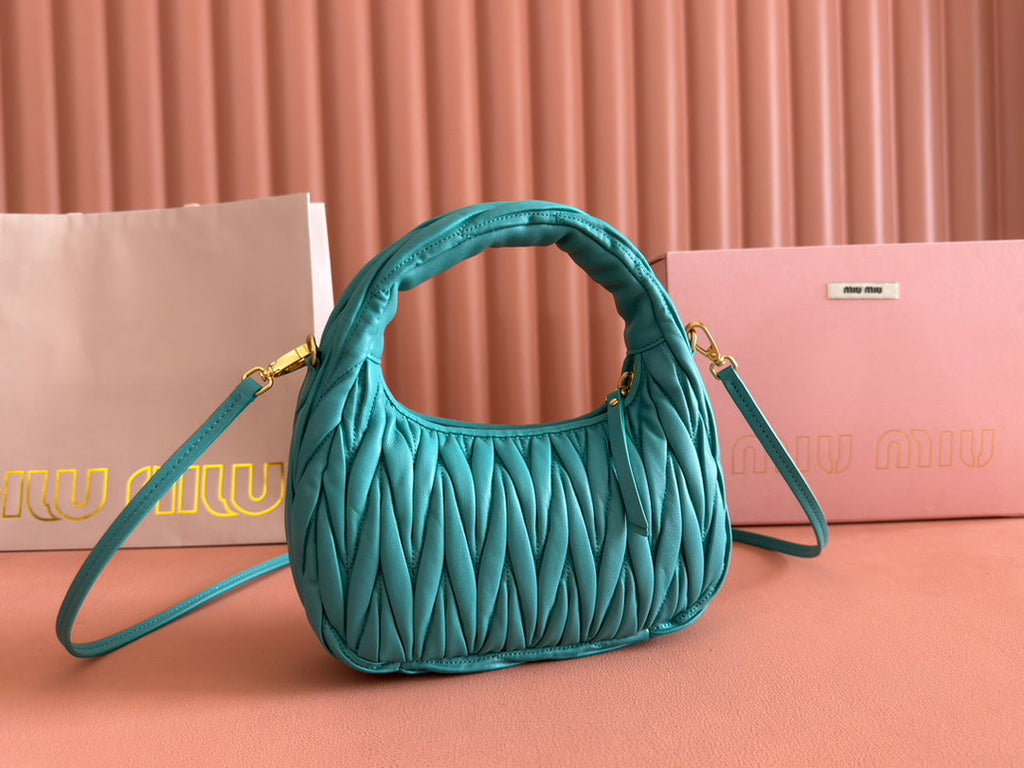 WANDER MATELASSÉ HANDBAG 23 IN LAGOON BLUE LAMBSKIN