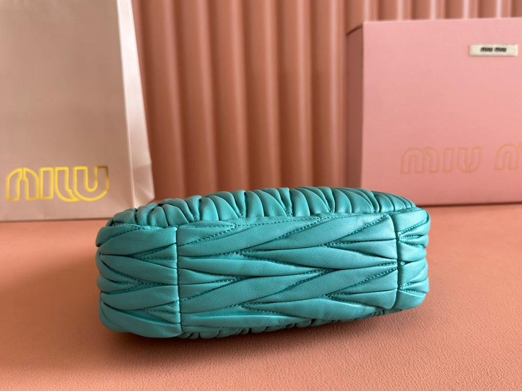 WANDER MATELASSÉ HANDBAG 23 IN LAGOON BLUE LAMBSKIN