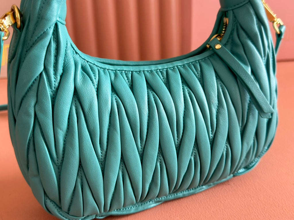 WANDER MATELASSÉ HANDBAG 23 IN LAGOON BLUE LAMBSKIN