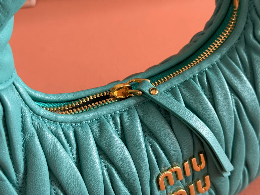 WANDER MATELASSÉ HANDBAG 23 IN LAGOON BLUE LAMBSKIN