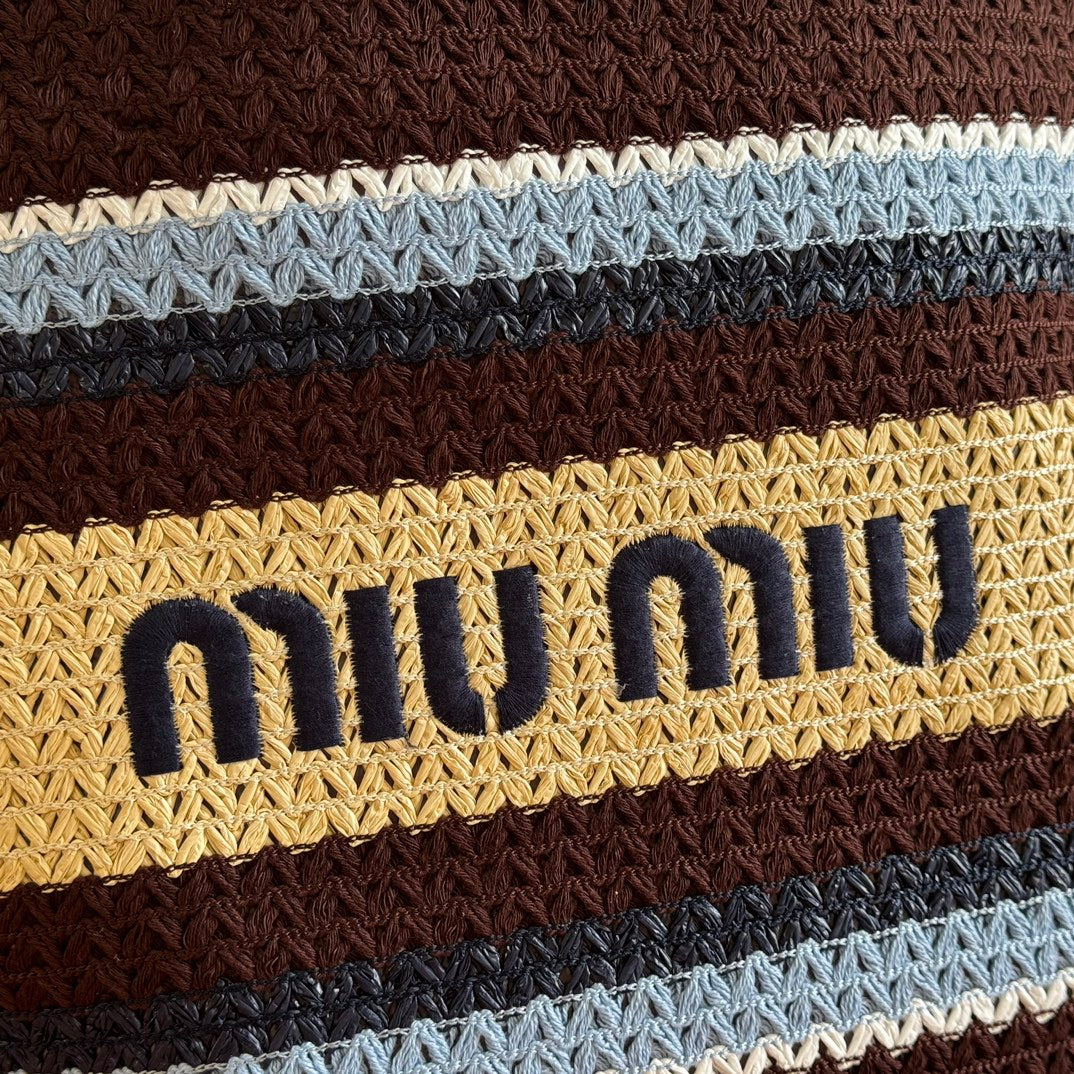 TOTE BAG 40 IN STRIPED PATTERN OF BROWN BLUE AND YELLOW WOVEN RAFFIA