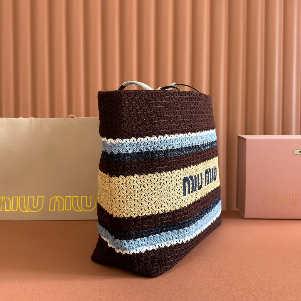 TOTE BAG 40 IN STRIPED PATTERN OF BROWN BLUE AND YELLOW WOVEN RAFFIA