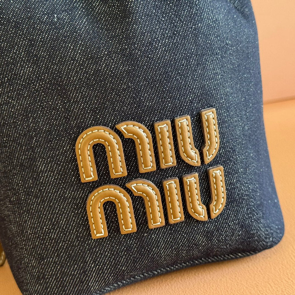 BUCKET BAG 22 DENIM BLUE AND BRANDY IN CANVAS