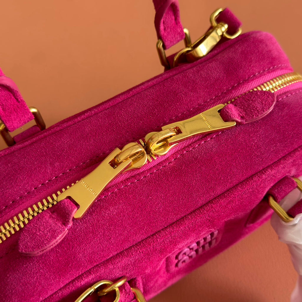 ARCADIE BAG 22 IN FUCHSIA SUEDE GOLD HARDWARE