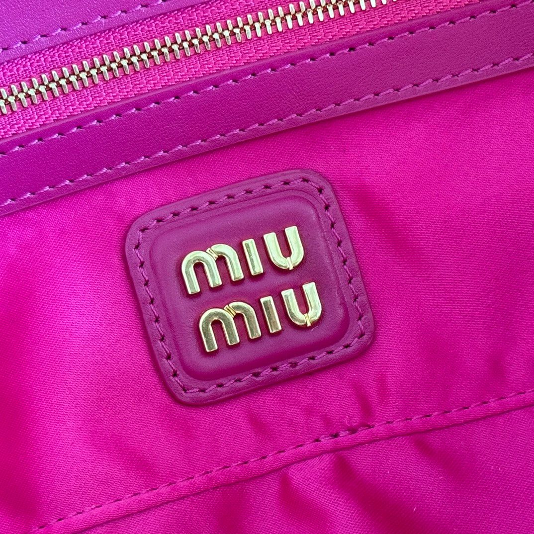 ARCADIE BAG 27 IN FUCHSIA SUEDE GOLD HARDWARE