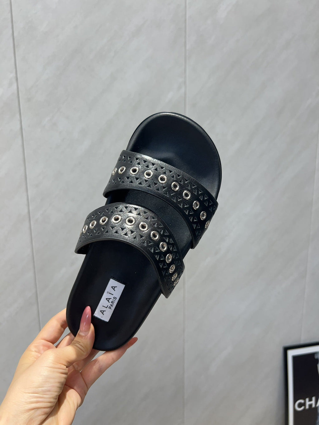 ALAIA DOUBLE-STRAP SANDALS 25S IN BLACK CALFSKIN