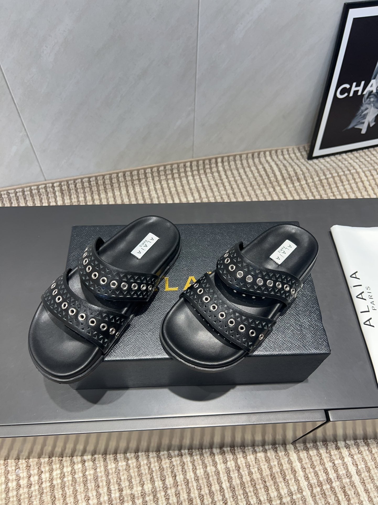 ALAIA DOUBLE-STRAP SANDALS 25S IN BLACK CALFSKIN