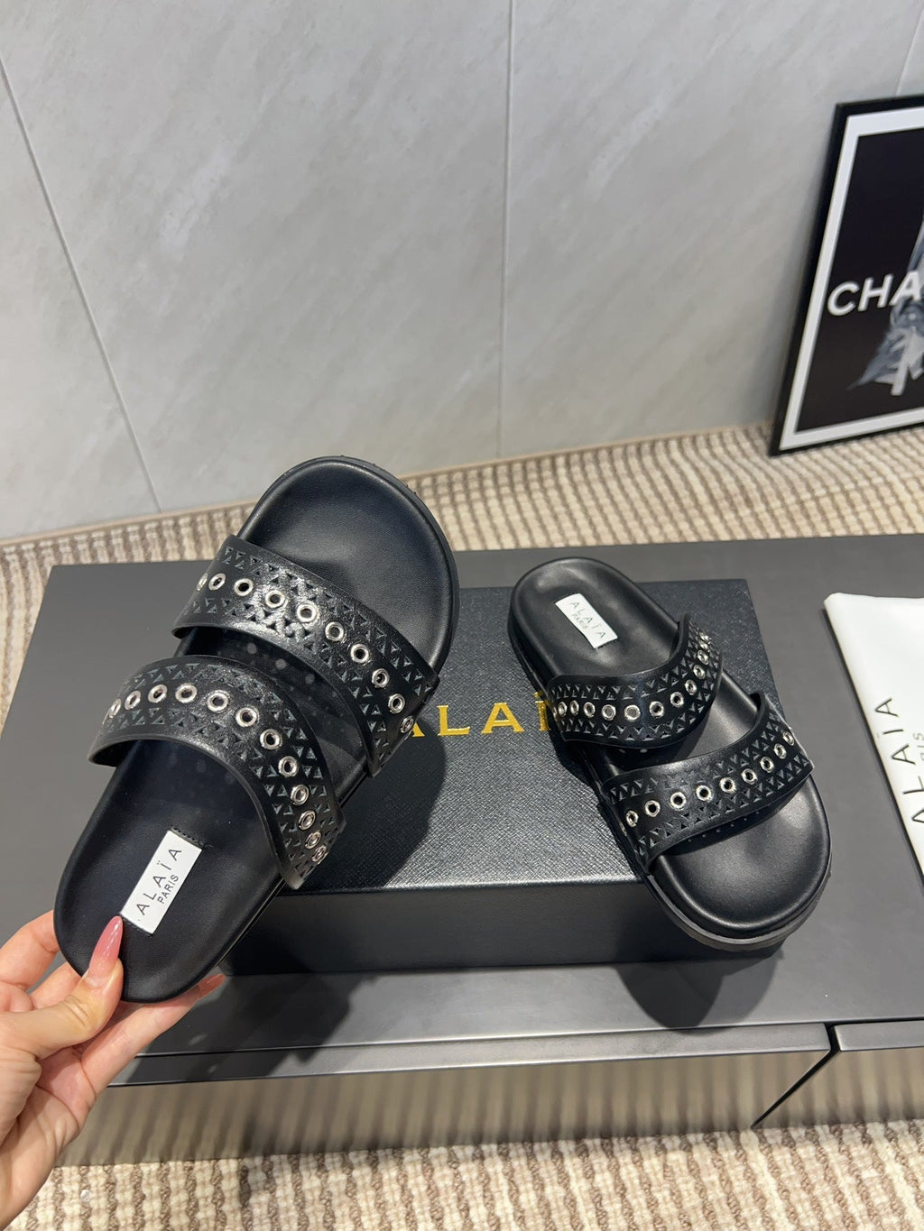 ALAIA DOUBLE-STRAP SANDALS 25S IN BLACK CALFSKIN