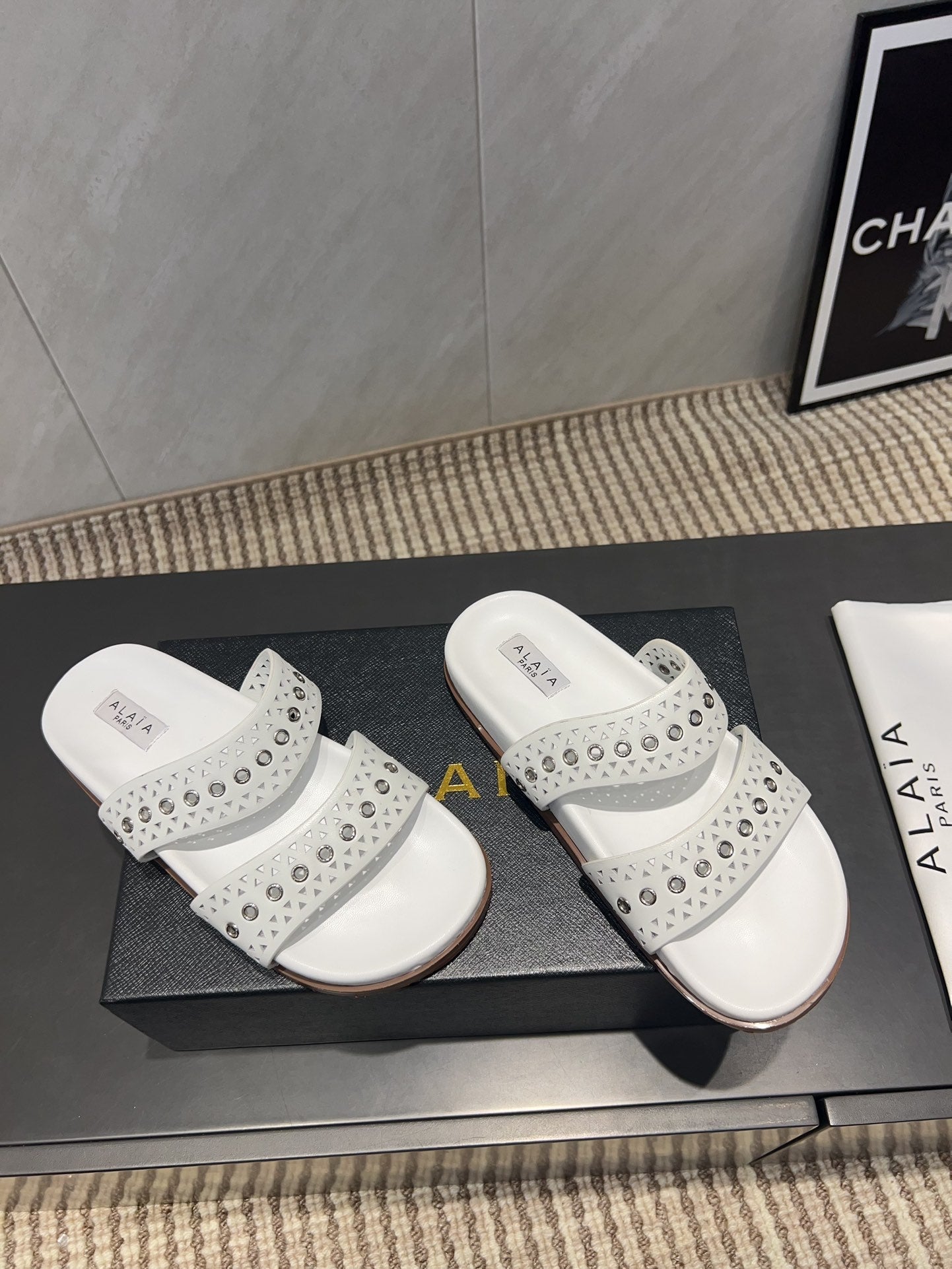 ALAIA DOUBLE-STRAP SANDALS 25S IN WHITE CALFSKIN