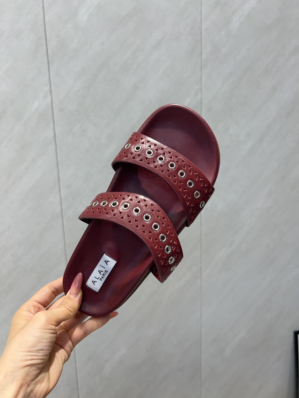 ALAIA DOUBLE-STRAP SANDALS 25S IN DARK RED CALFSKIN
