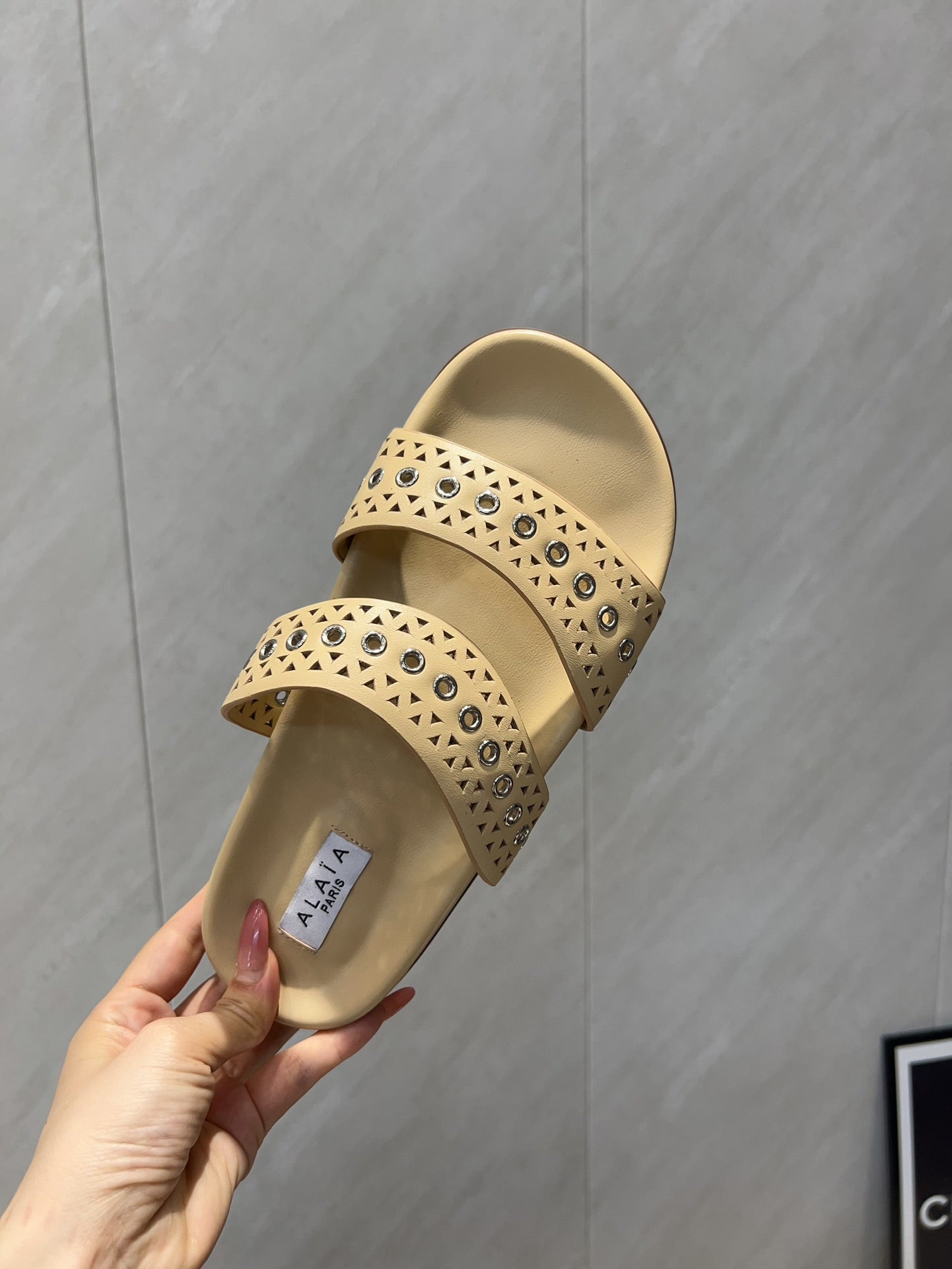 ALAIA DOUBLE-STRAP SANDALS 25S IN BEIGE CALFSKIN