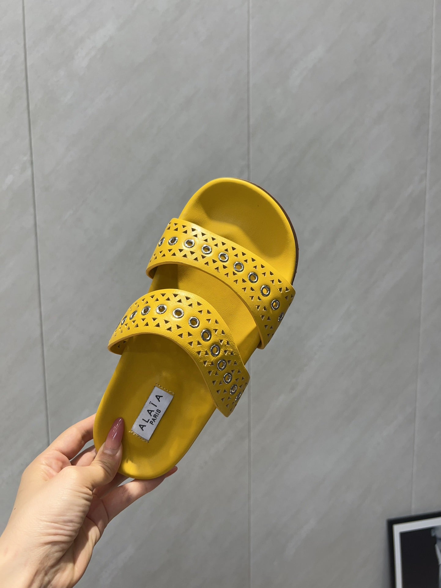ALAIA DOUBLE-STRAP SANDALS 25S IN YELLOW CALFSKIN