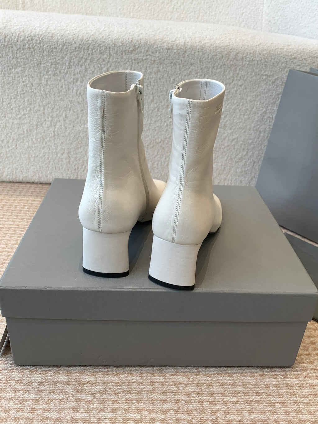 ANKLE BOOTS IN WHITE LOGO EMBOSSED SOFT SHEEPSKIN