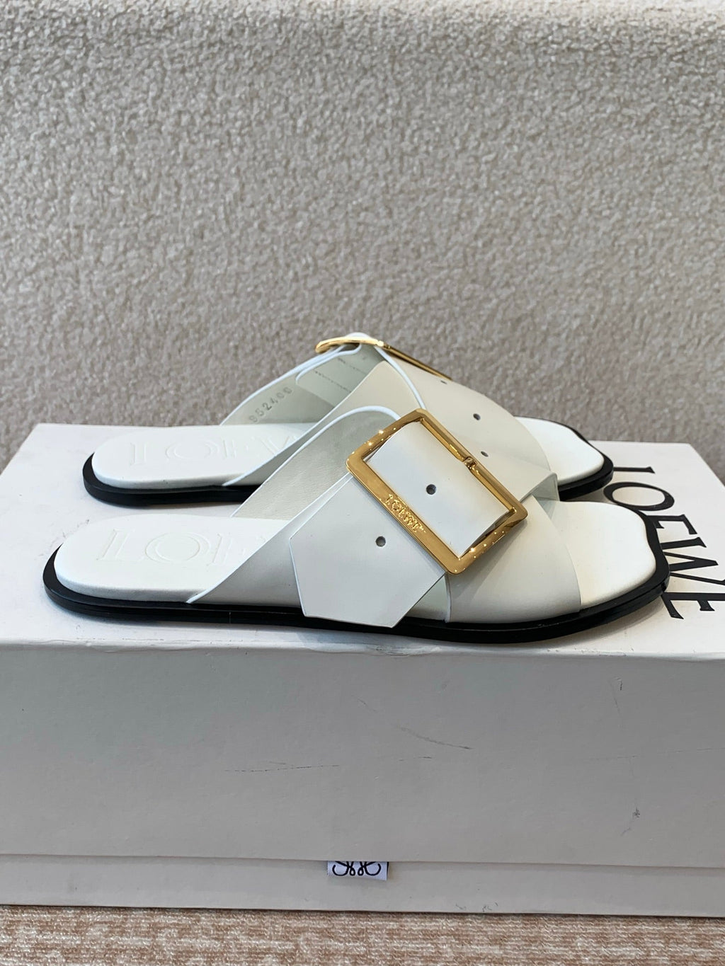 PETAL BELT FLAT SANDAL IN WHITE CALFSKIN