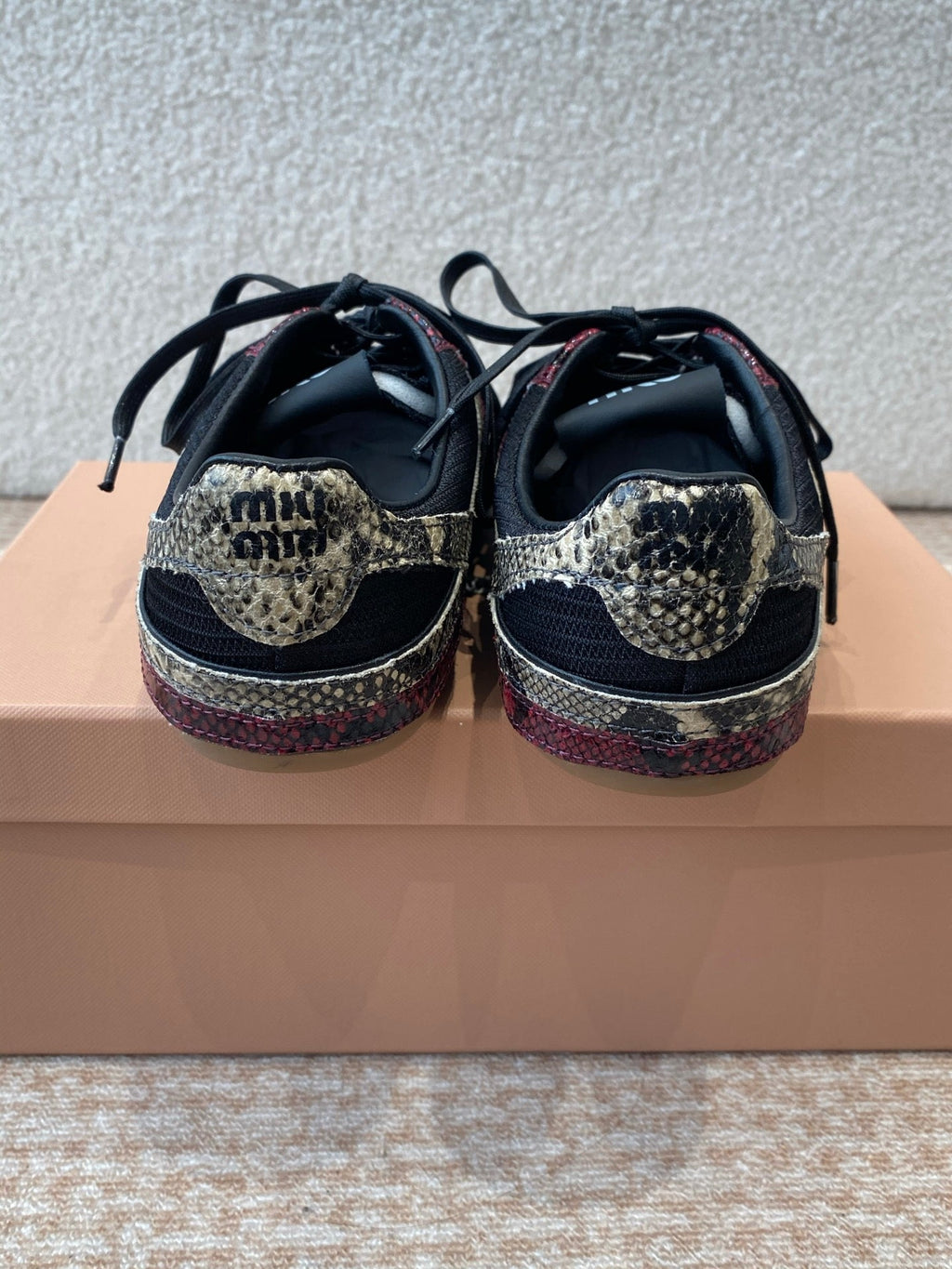 GYMNASIUM SNEAKER IN BLACK FABRIC AND BLACK RED SNAKE EFFECT CALFSKIN