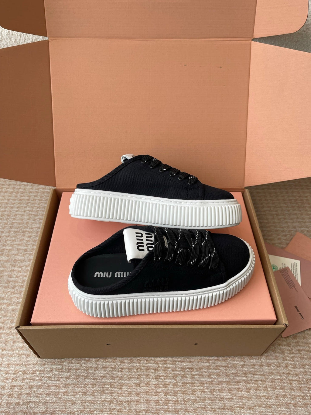 WASH SNEAKER MULES IN BLACK DENIM