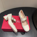 ROGER VIVIER 25S TRÈS VIVIER 50MM IN IVORY CALFSKIN WITH RHINESTONE BUCKLE