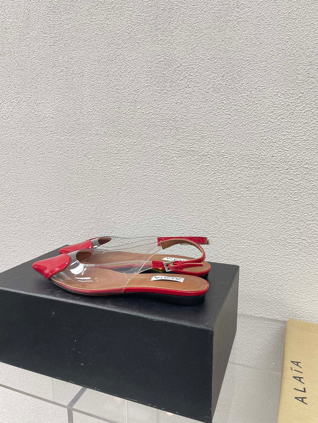 ALAIA LE COEUR FLAT SLINGBACKS IN CHERRY RED PATENT LAMBSKIN