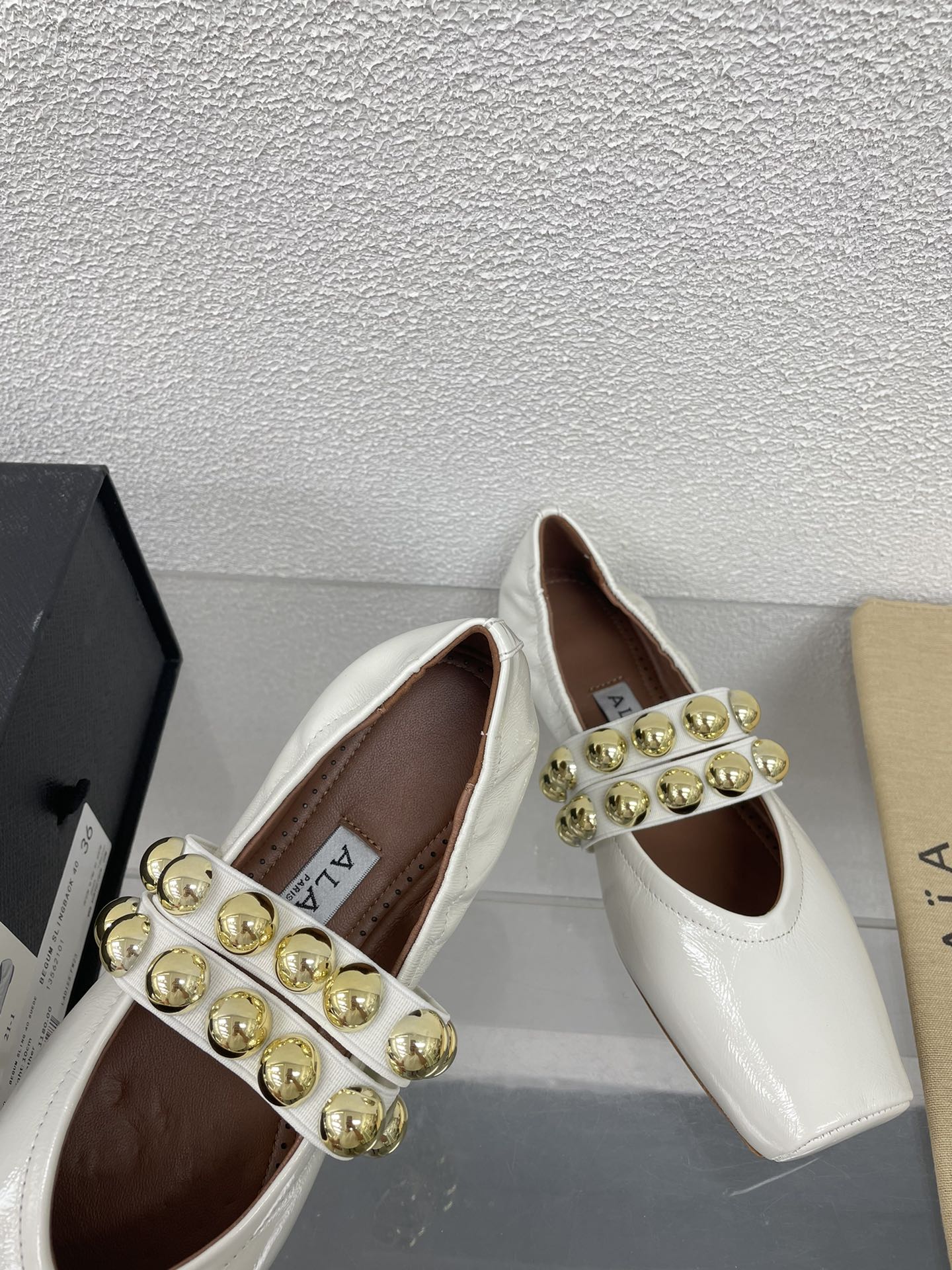 ALAIA MARY JANE PEARL IN GLOSSY WHITE LAMBSKIN