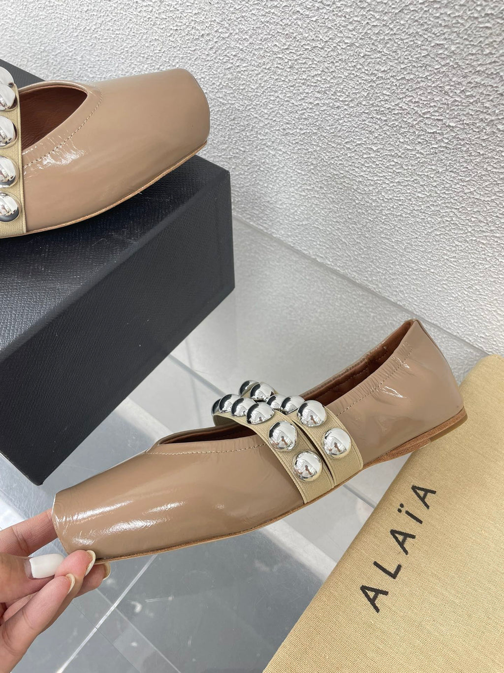 ALAIA MARY JANE PEARL IN GLOSSY BEIGE LAMBSKIN
