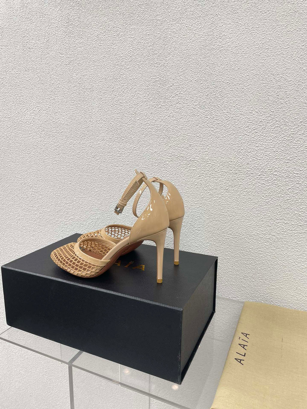 ALAIA HIGH FISHNET 9 CM PUMPS IN EGG NOG MESH