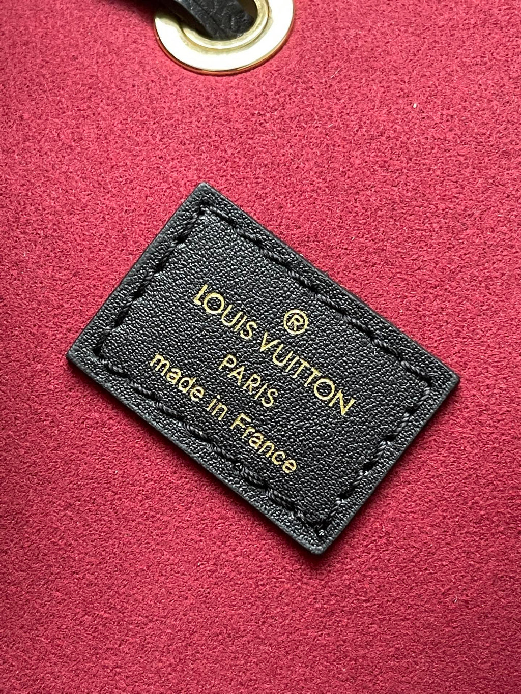 CRAFTY NEONOE 26 IN BLACK AND CREAM BICOLOR EMPREINTE CALFSKIN