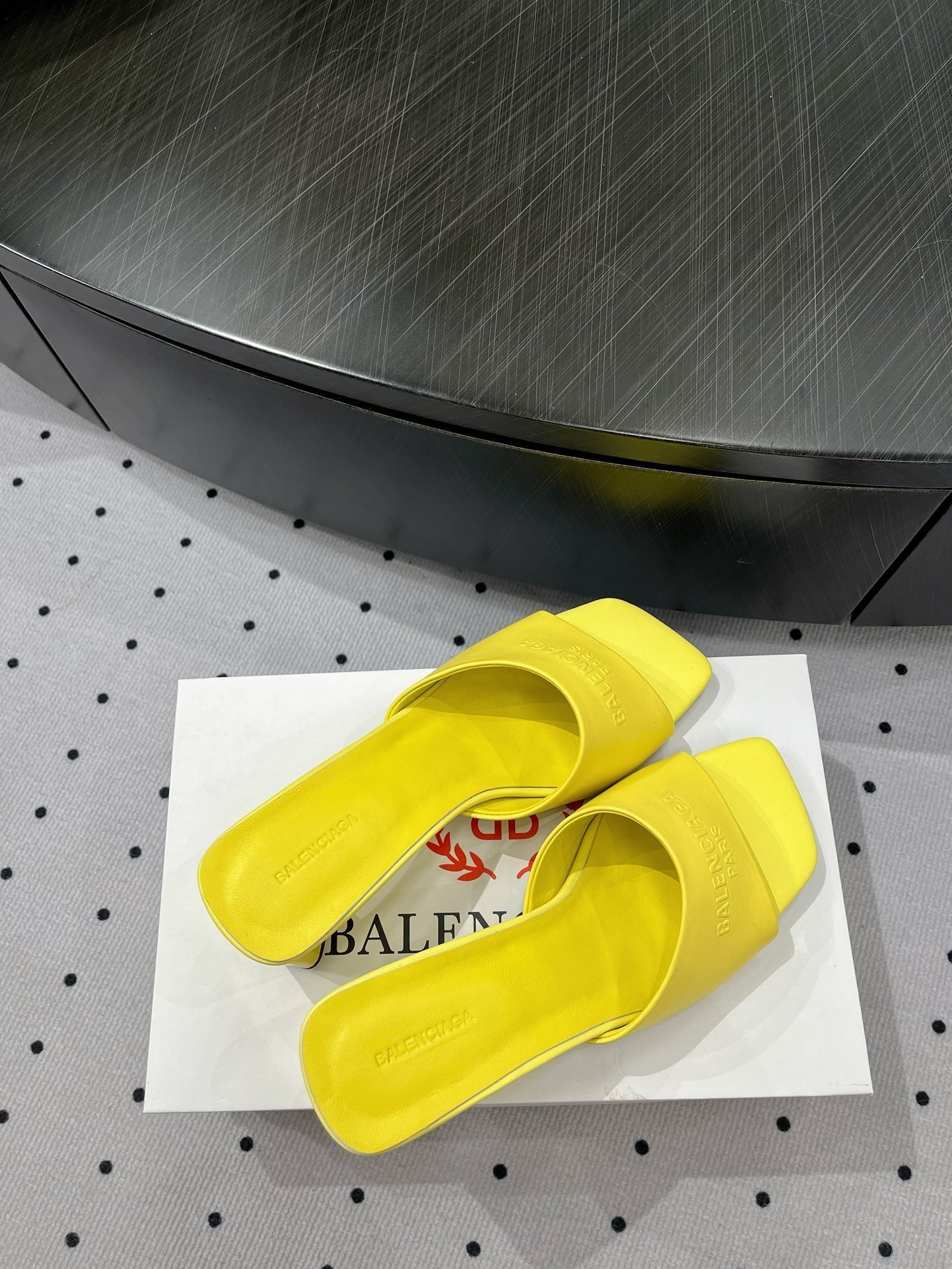 SQUARE-TOE MEDIUM HEEL MULES IN YELLOW CALFSKIN LOGO EMBOSSED