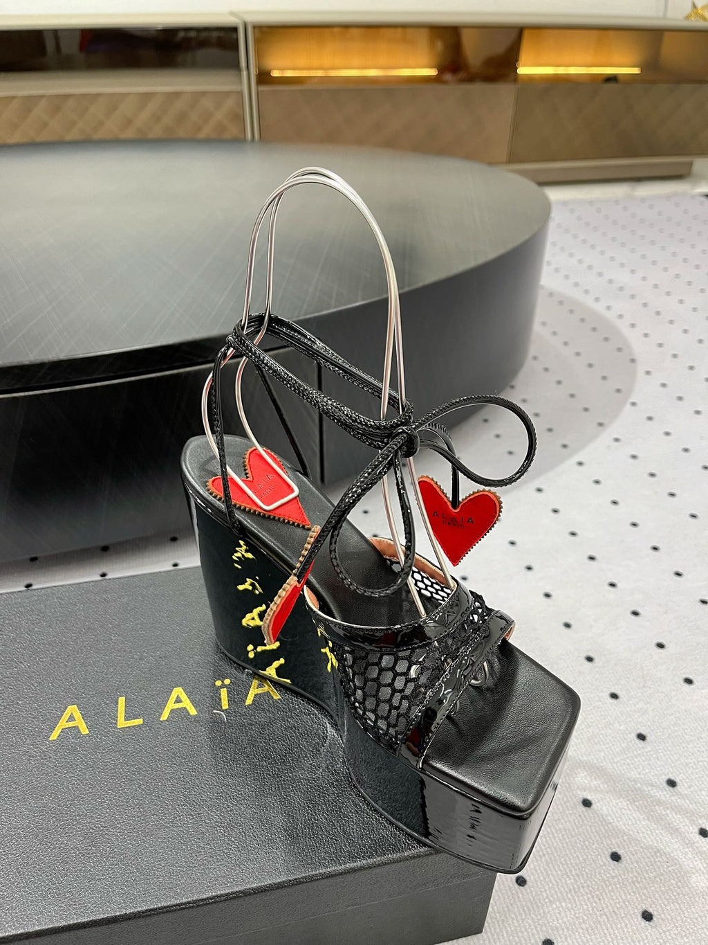 ALAIA BANQUET WEDGE SANDALS IN BLACK LAMBSKIN WITH RED HEART