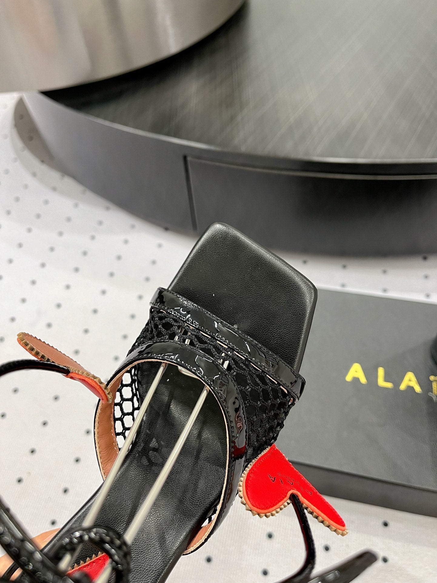 ALAIA BANQUET WEDGE SANDALS IN BLACK LAMBSKIN WITH RED HEART