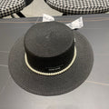 MM SMALL-BRIM STRAW HAT IN BLACK AND PEARL EMBELLISHED