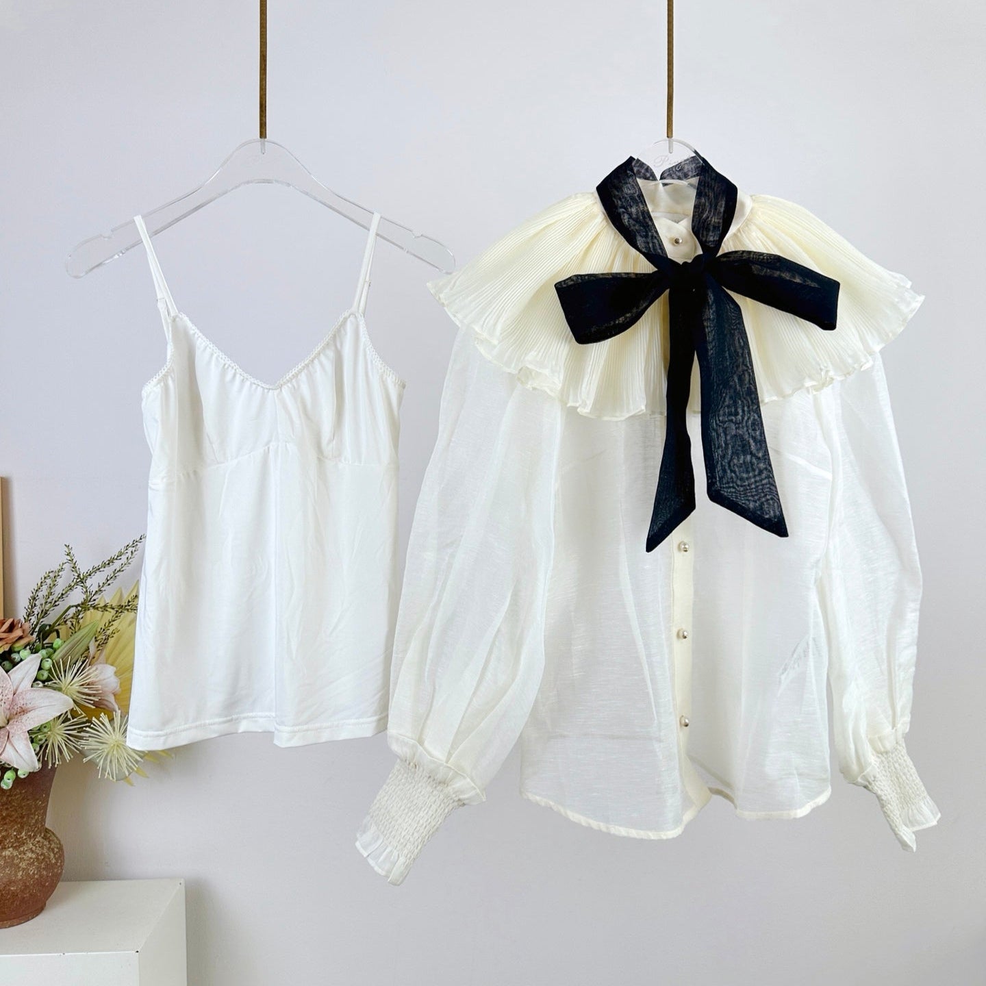 WHITE DRESSY TOP WITH BLACK TIE-NECK