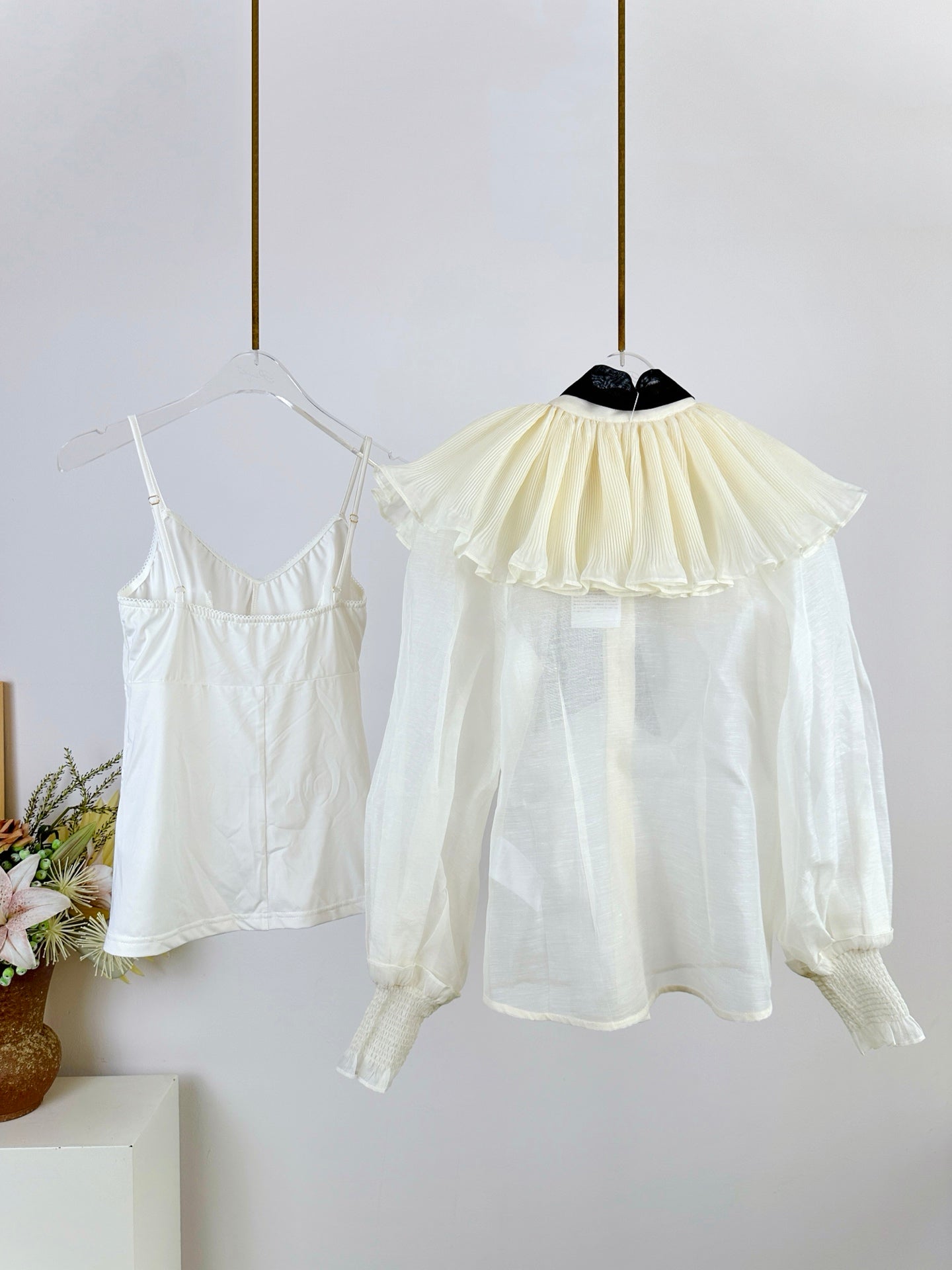 WHITE DRESSY TOP WITH BLACK TIE-NECK