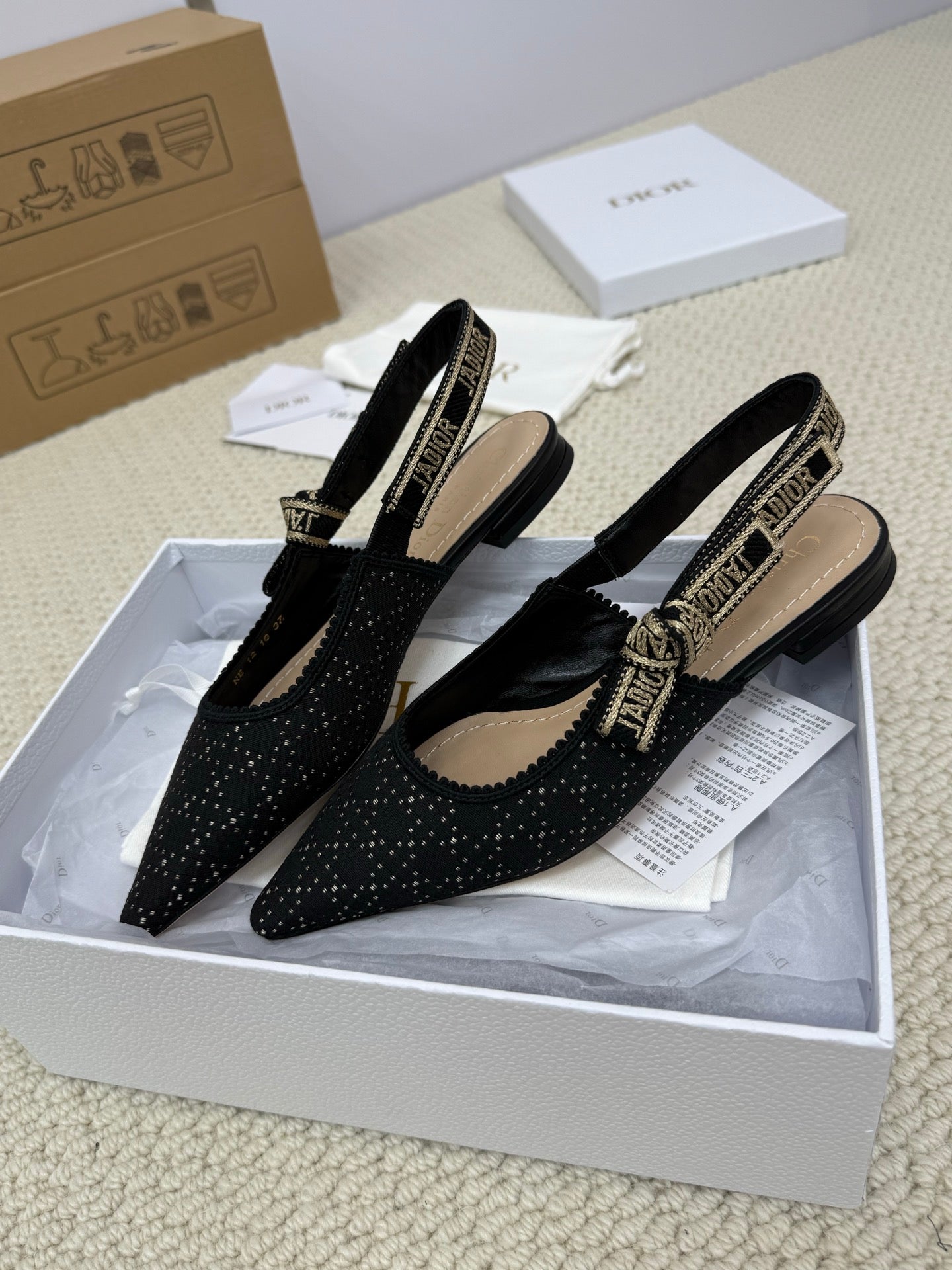 DIOR FLAT SLINGBACK 25S IN BLACK FABRIC AND BRAND NAME EMBROIDERY